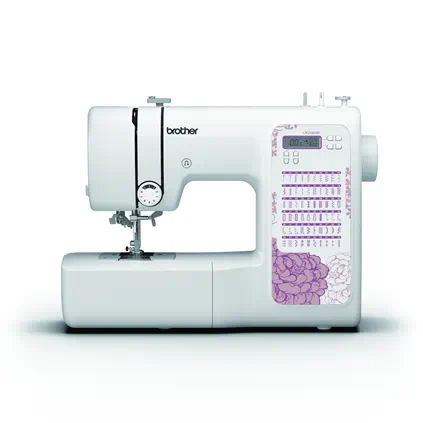 Sewing machine and cloth on a pink background. Sew clothes on a