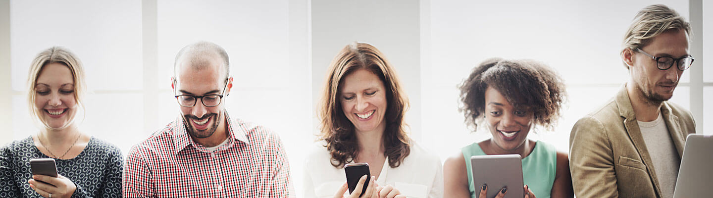 Five Professionals Using Mobile Devices